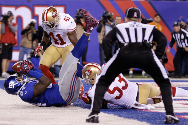Superbe réception de Larry Donnell devant Bowman et Bethea