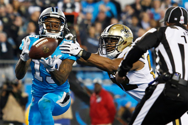 Ted Ginn Jr bat Craig Robertson pour le TD de 40 yards